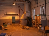 Workshop with machinery and boiler stack