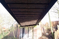 Under railway bridge across canal and Cross City Line